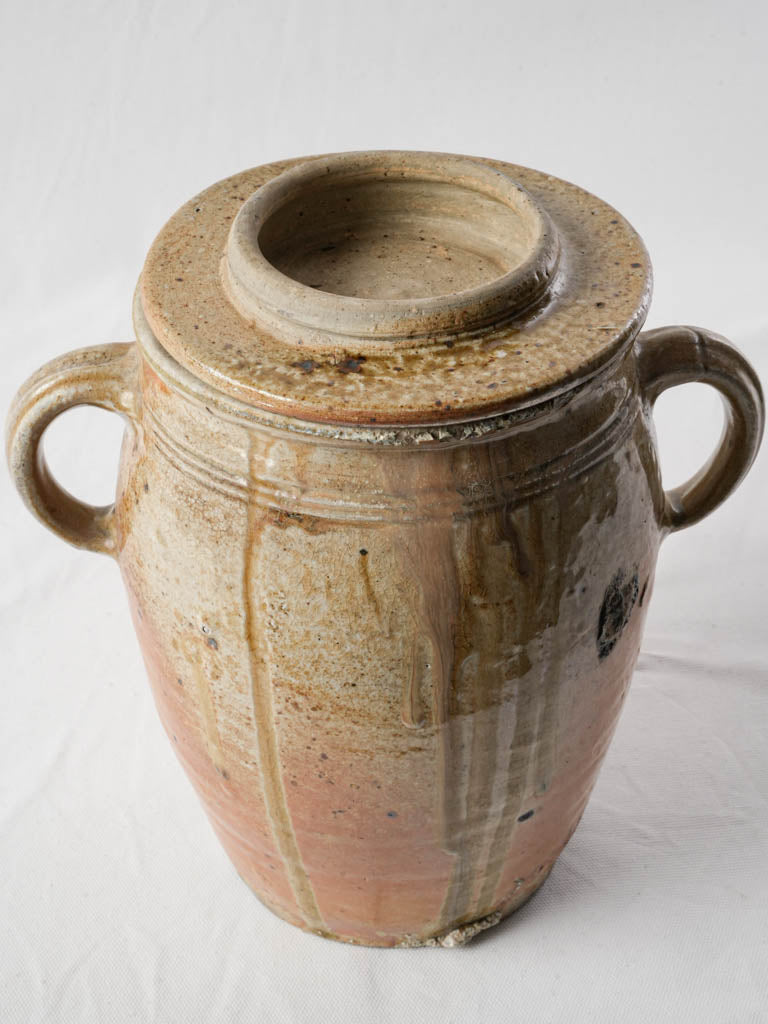 Elegant worn stoneware jar