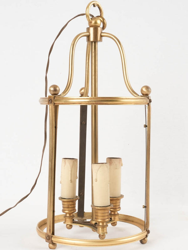 Antique finish three-bulb chandelier