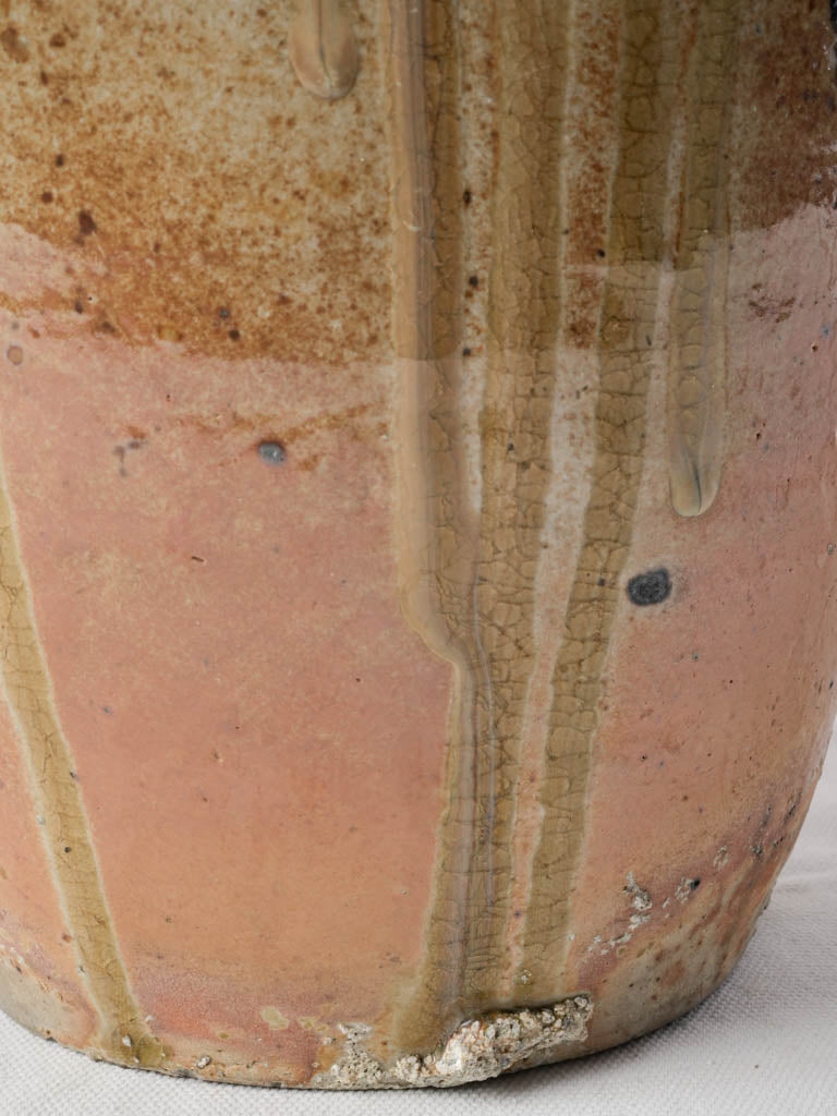 Warm-toned antique grease jar