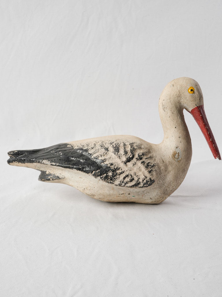 Patina-rich earthy-toned garden stork