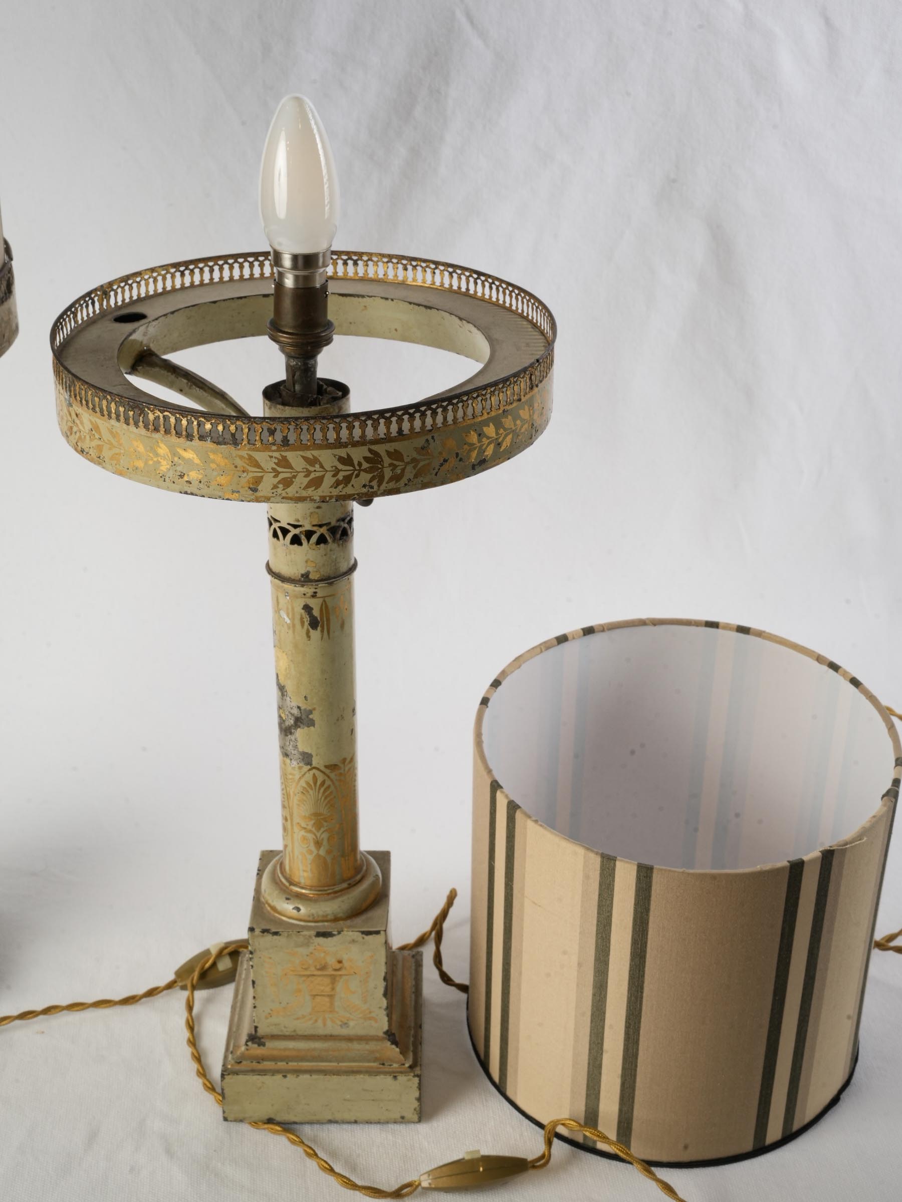 Faded cream and gilt lamps