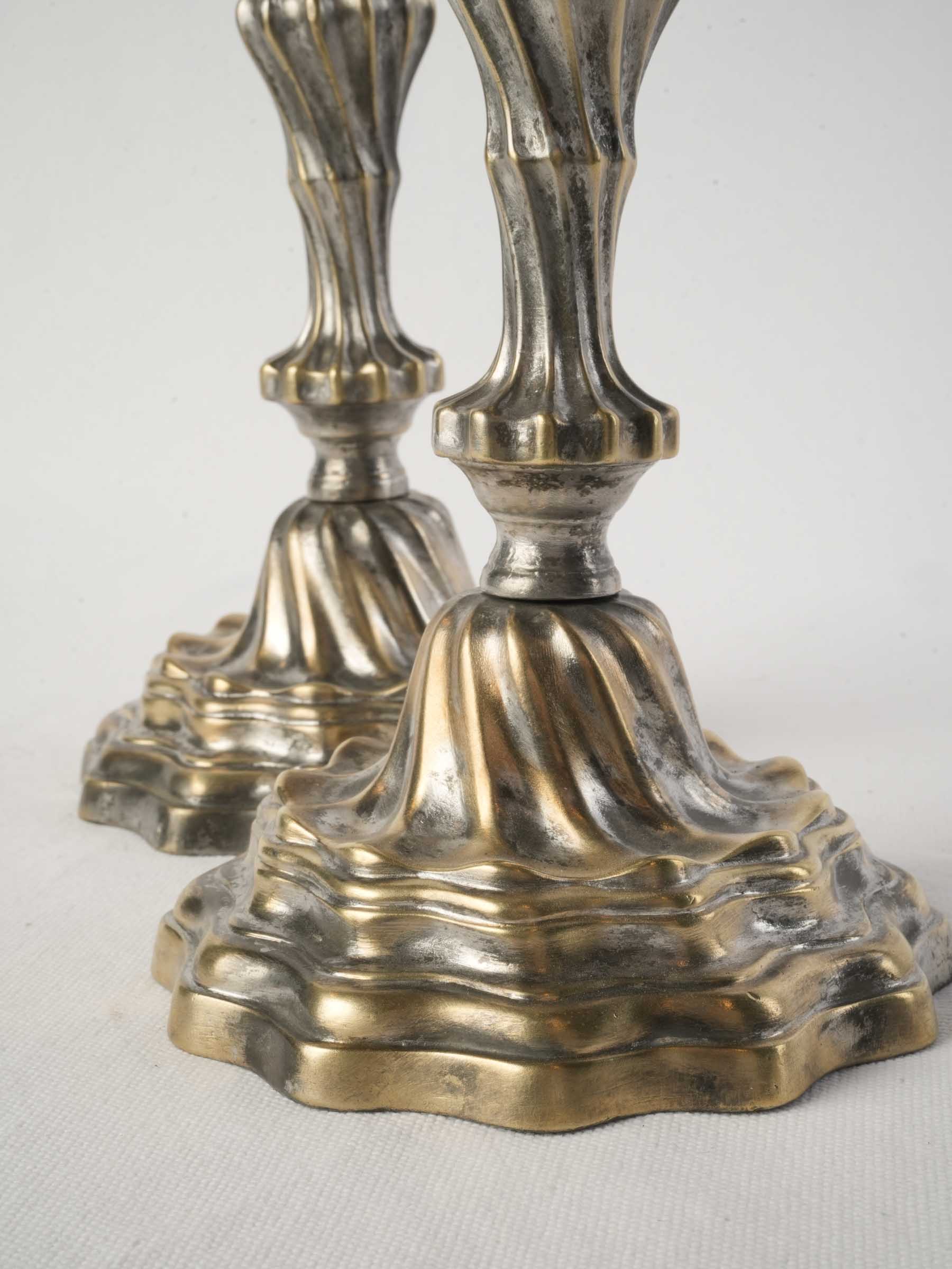 Richly contoured form candlesticks