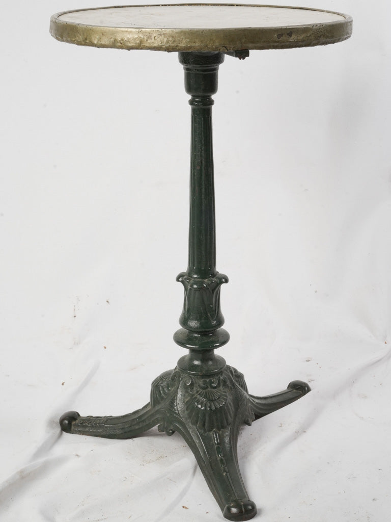 Vintage brass-rimmed accent table