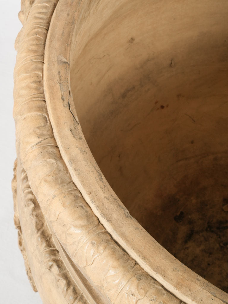 Tuscan terracotta urn with garlands