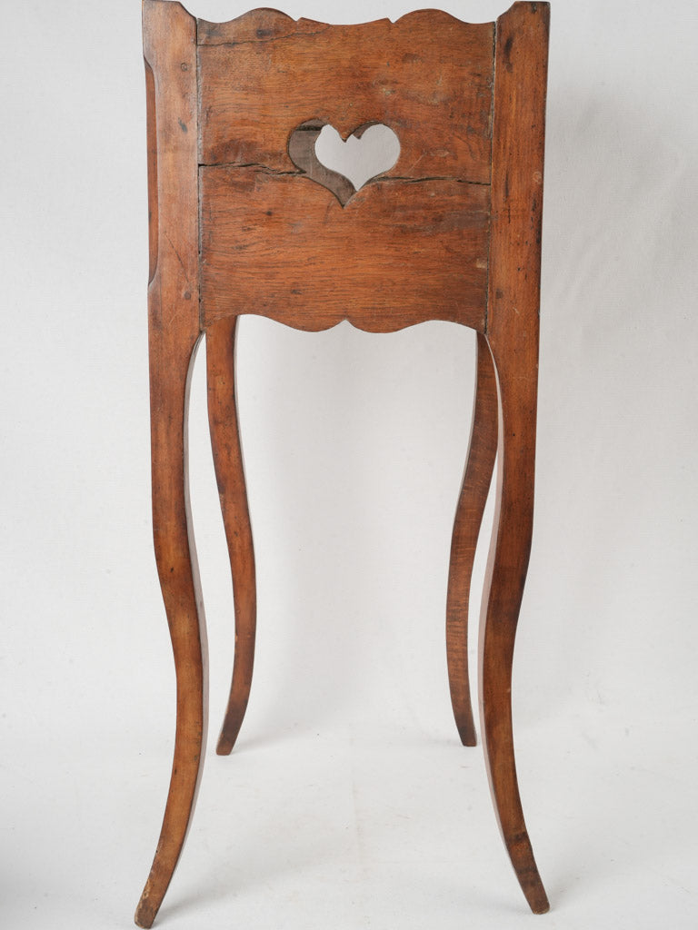Graceful scalloped-top nightstand
