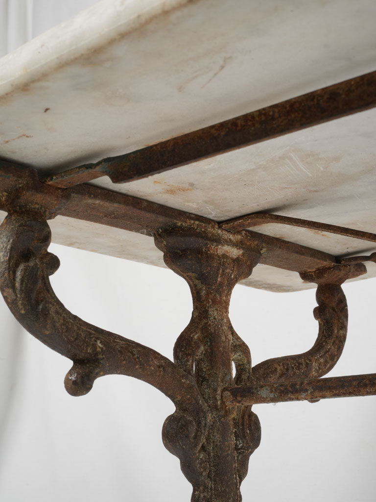 Timeless brass-threaded marble table