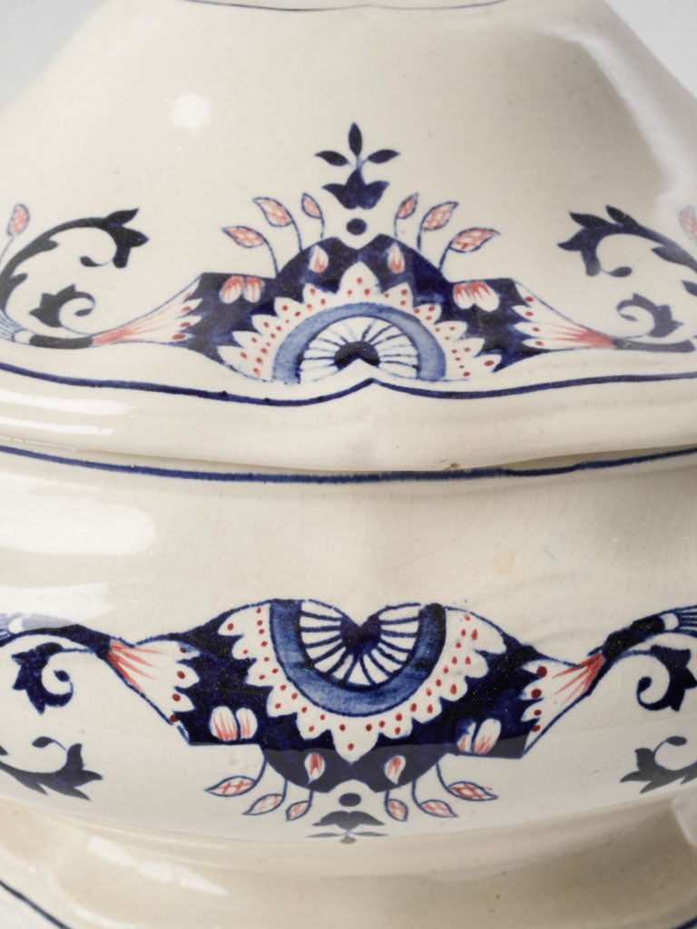 Elegant finial-topped ceramic tureen