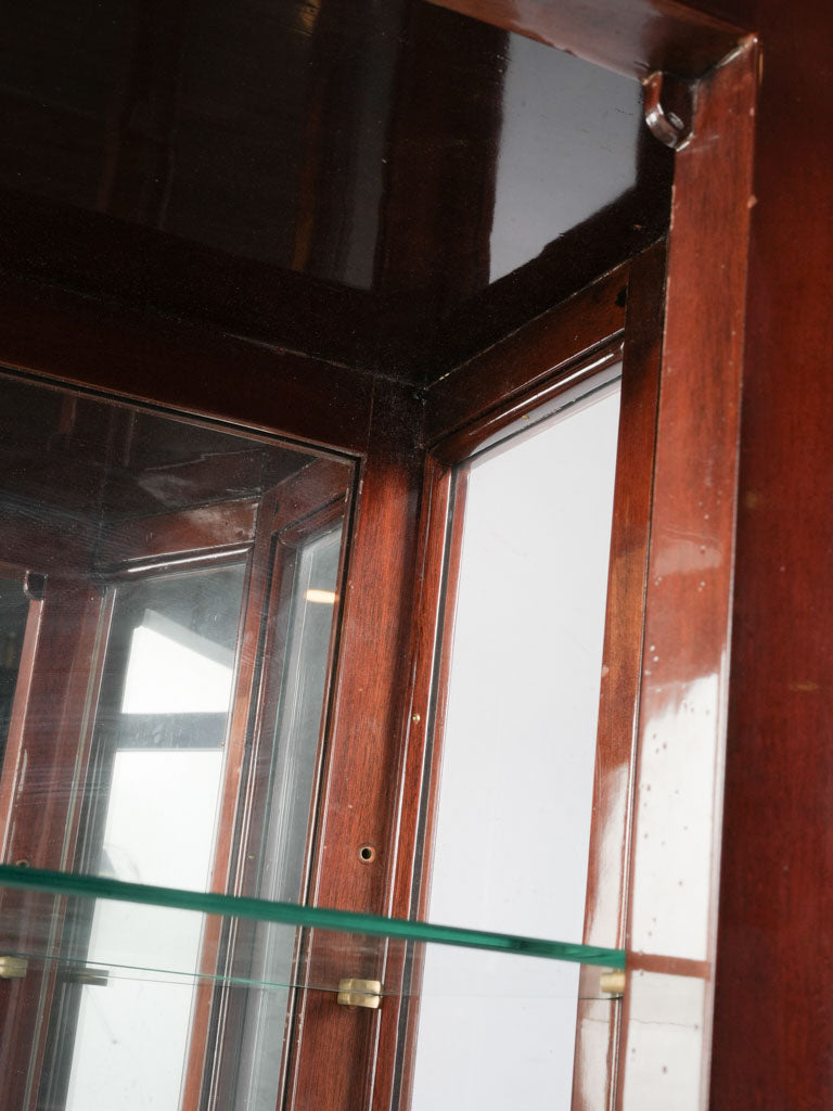 Narrow brass-banded display case