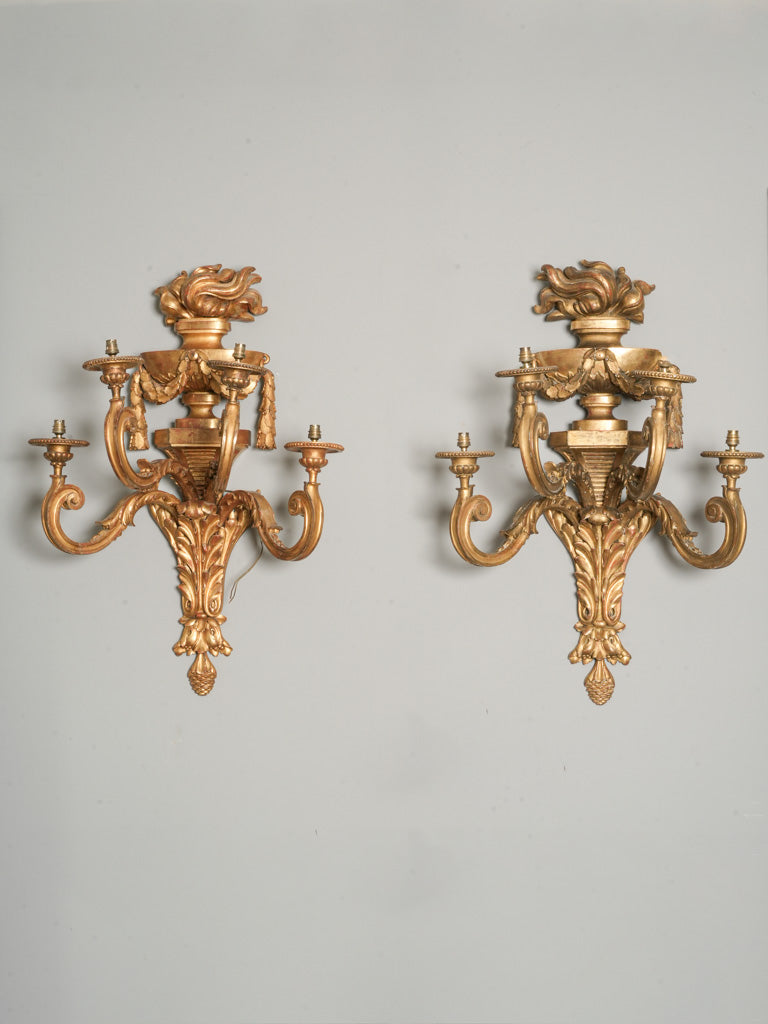 Ornate neoclassical gold leaf sconces