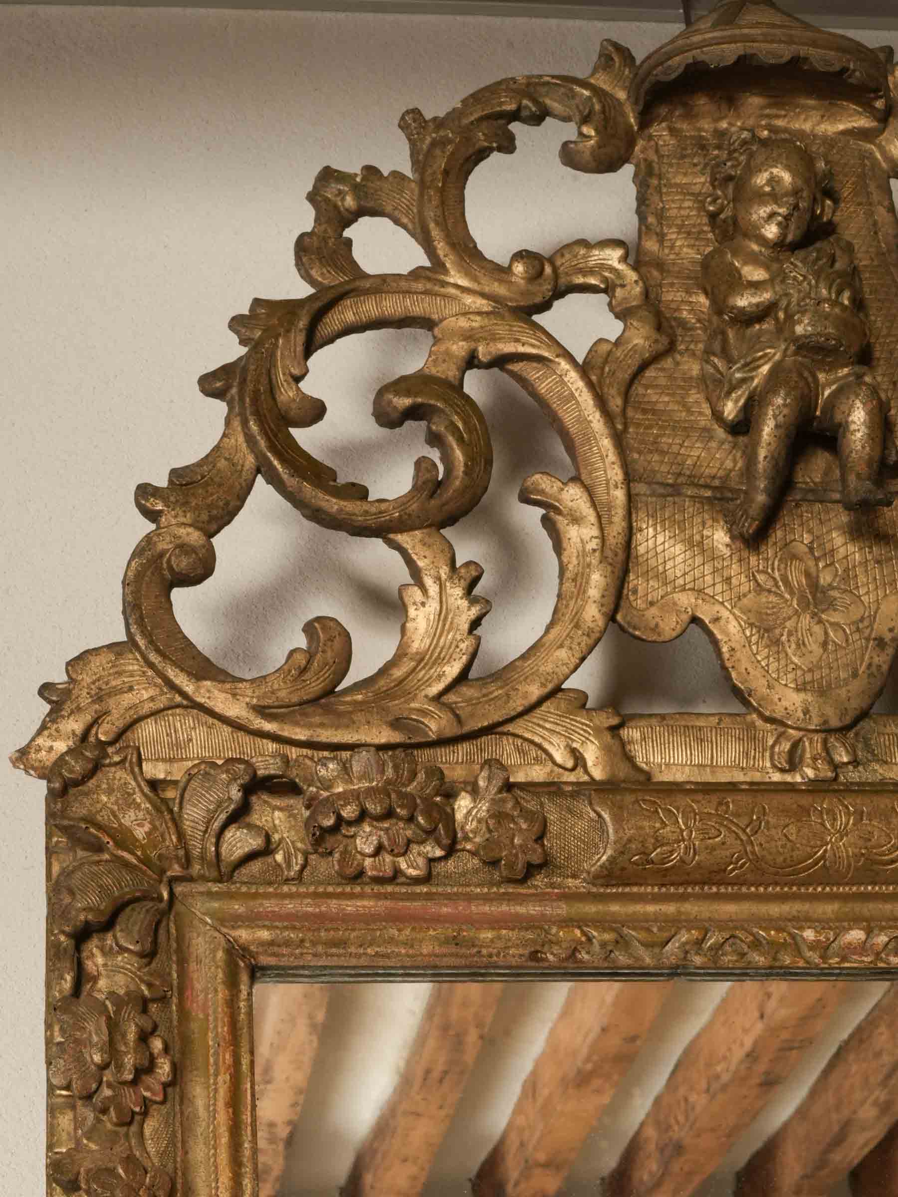 Aged handcrafted period mirror