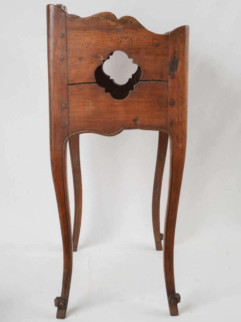 Intricate walnut nightstand quatrefoil cutouts