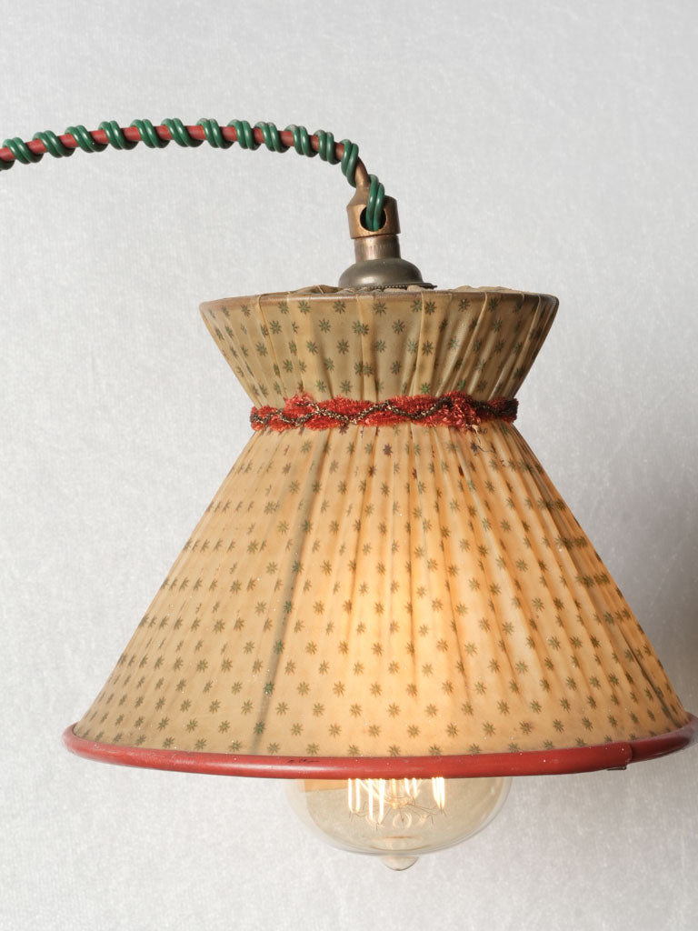 Symmetrical, metal light with French charm