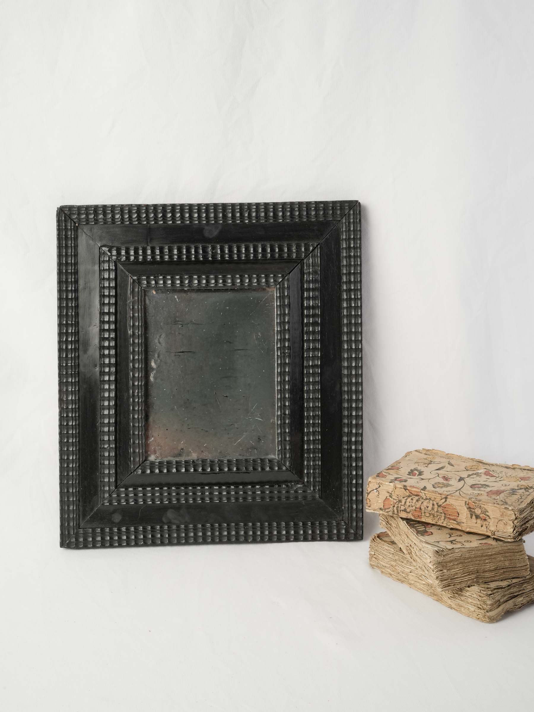 Small French Ebonized Guilloché Mirror w/ Foxed Mercury Glass, 17th Century - 17" x 15"
