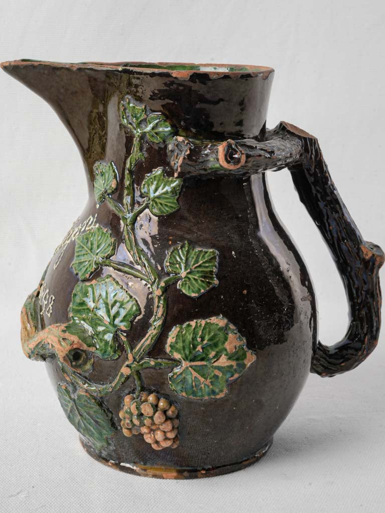 Textured earthenware relief pitcher