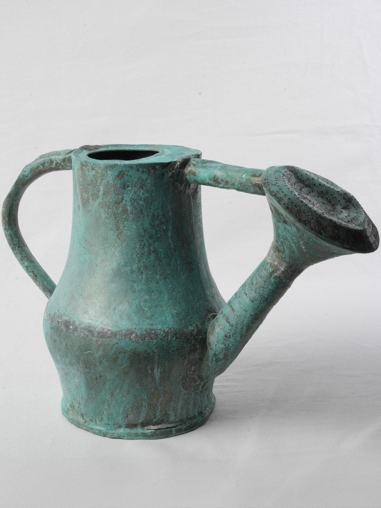 Antique hammered copper watering can