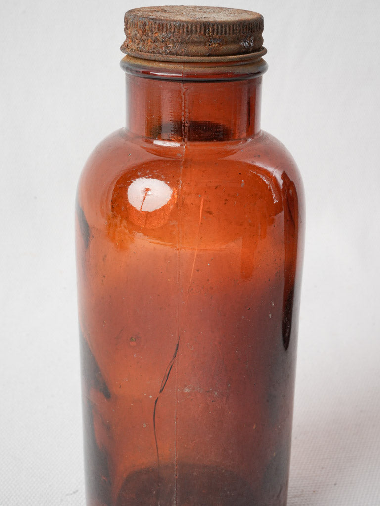 Rustic patinated metal-stopper bottle