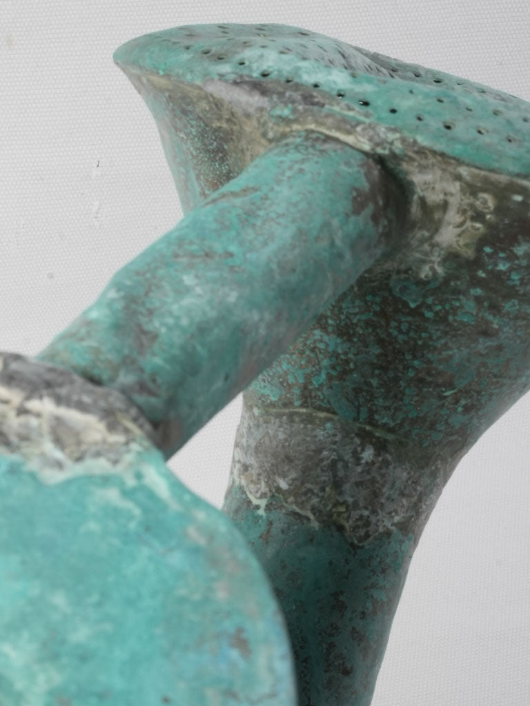 Glowing patina copper watering can