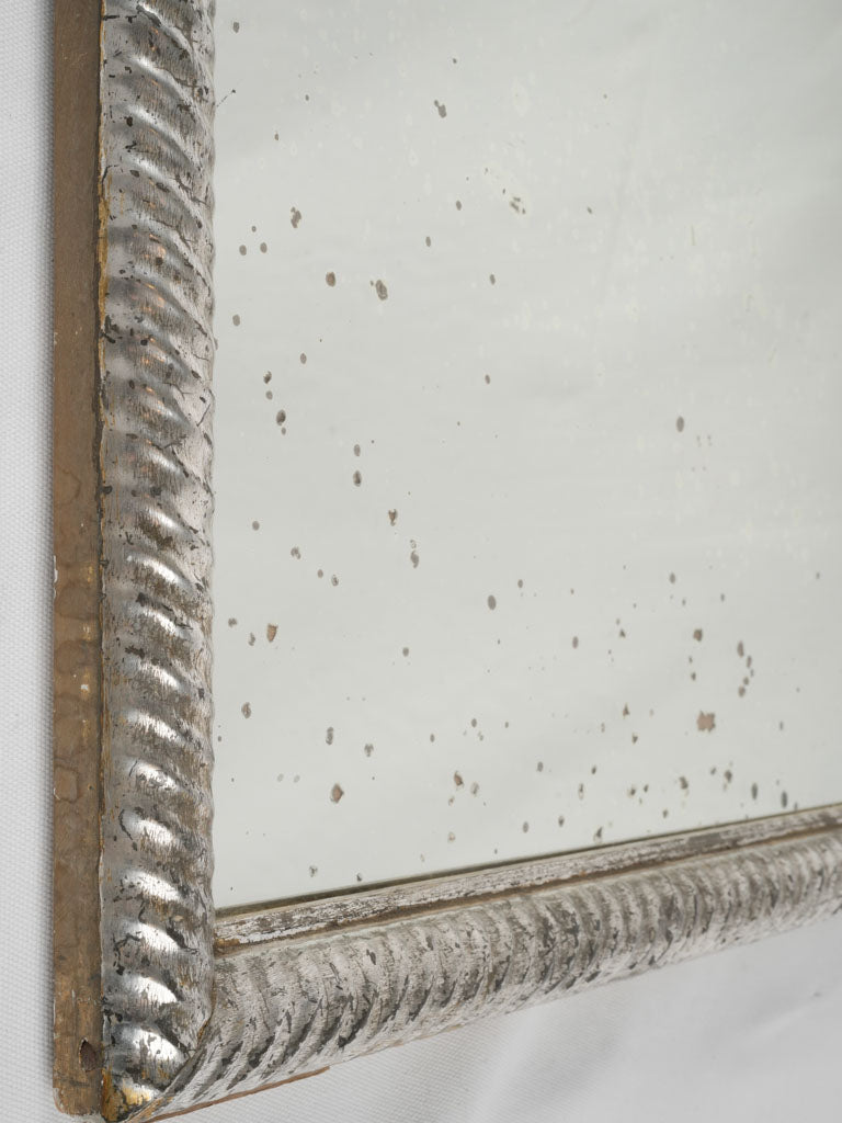 Spectacular 18th-century ribbed silver mirror