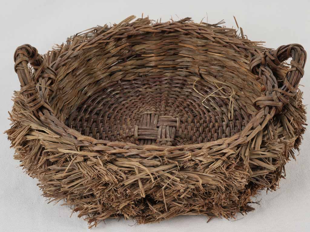 Quaint vintage straw fruit basket