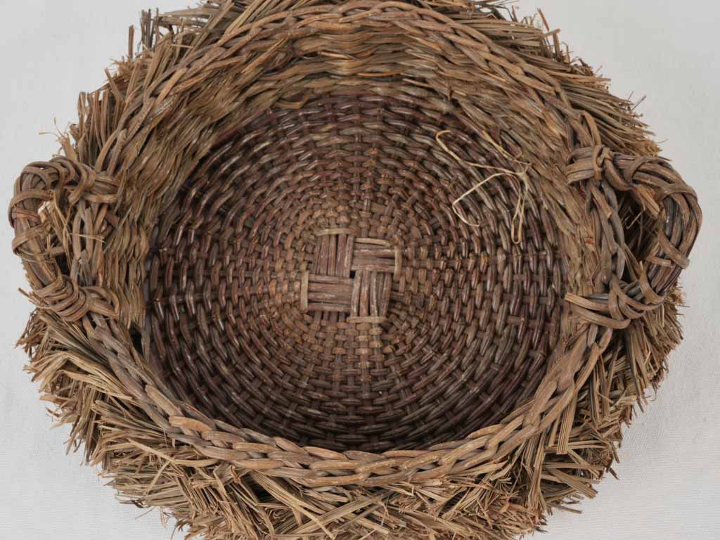 Antique bird nest wicker basket