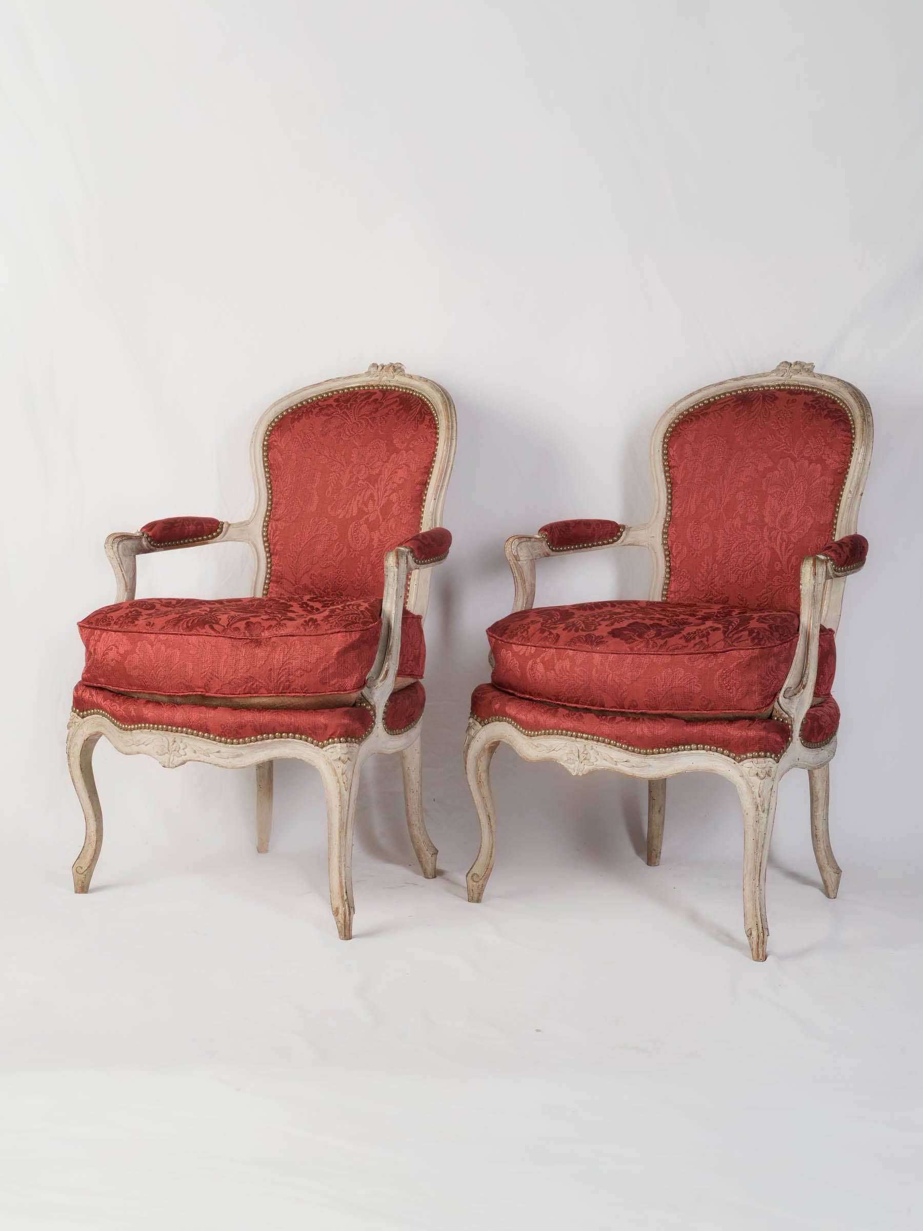 Elegant antique wooden armchairs