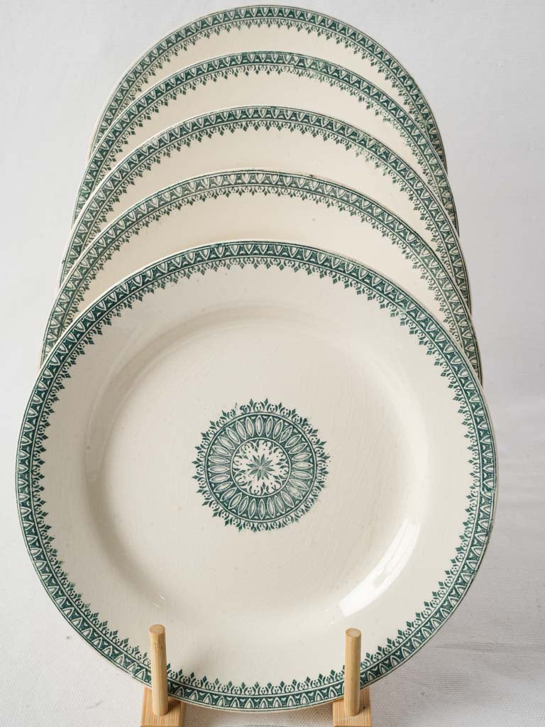 Intricate lace-motif dinnerware pieces
