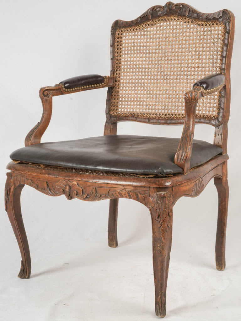 Finely hand-carved wooden armchair