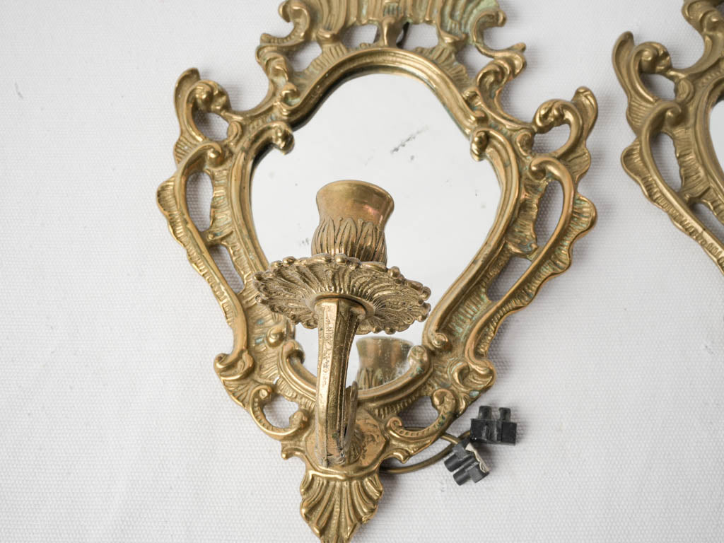 Richly aged rococo brass sconces