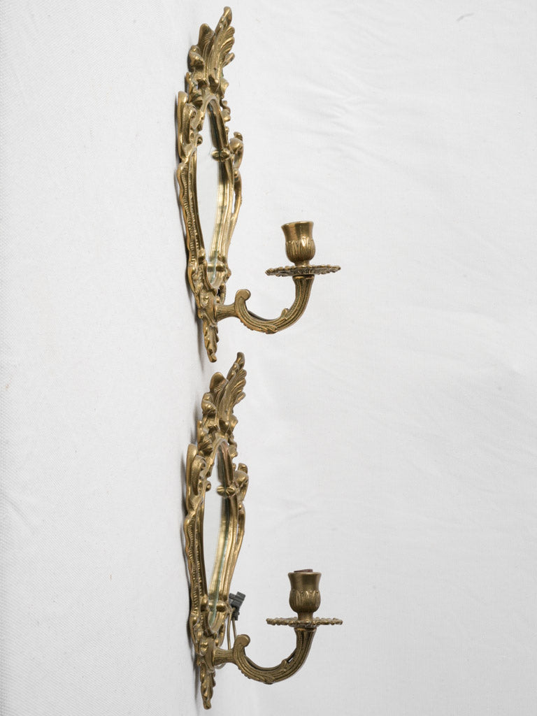 Aged rocaille style brass reflectors