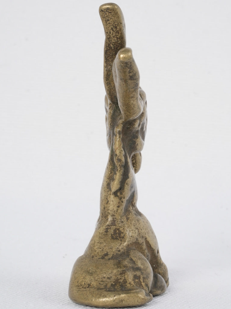 Patinaed, quirky donkey bottle opener