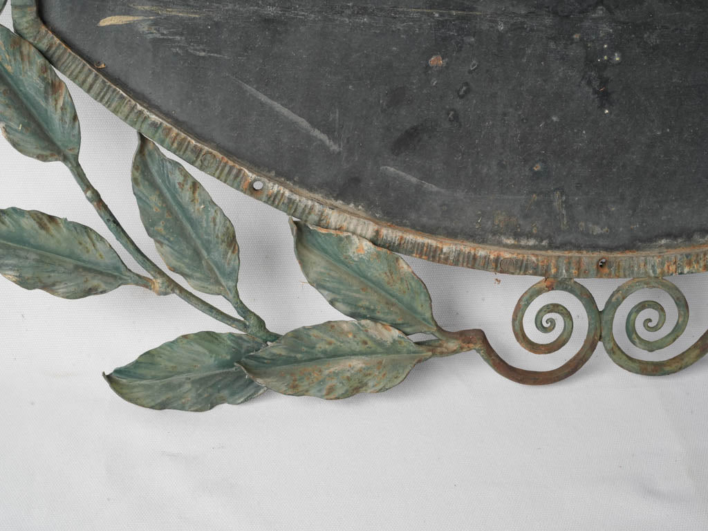 Slate-blue foliate architectural element