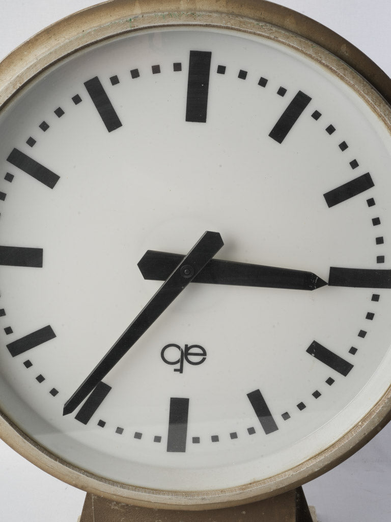 Antique double-sided clock with patina