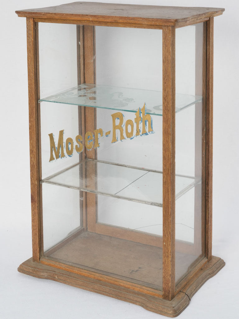 Antique wood-framed Moser-Roth display case