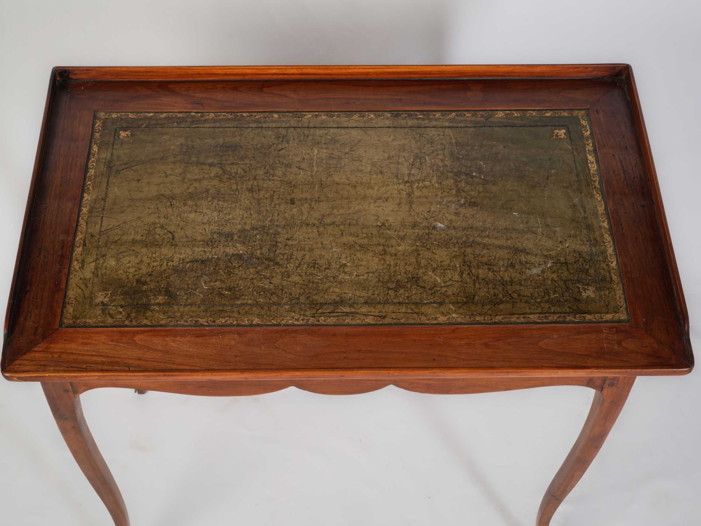 Distinctive fruitwood antique writing table
