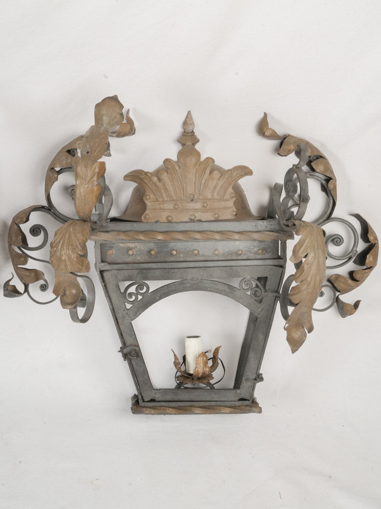 Elaborate wrought iron wall sconces
