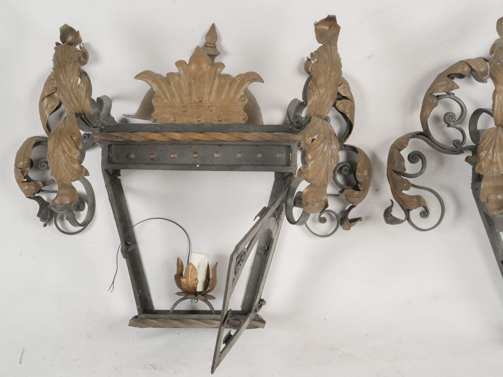 Elegant gilded wrought iron sconces