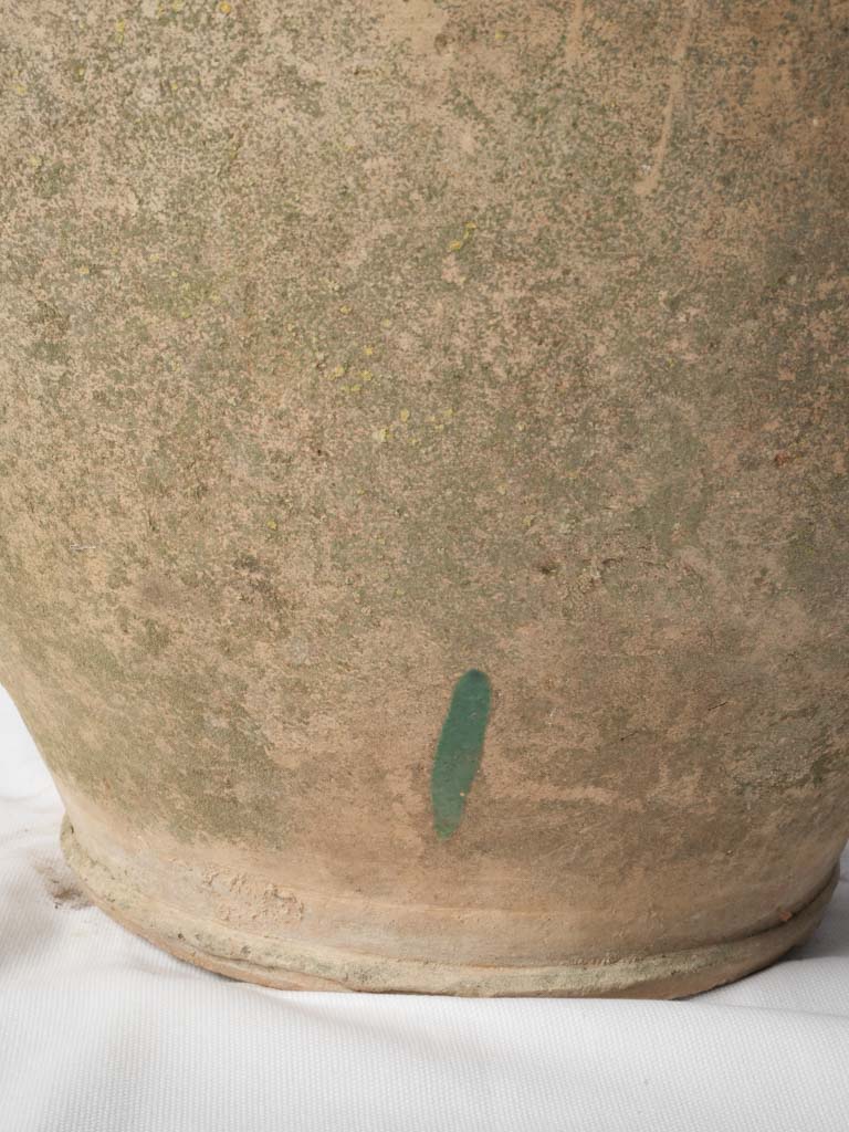Distinctive copper-green dripped container