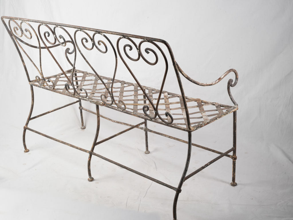 Ornate weathered finish garden bench
