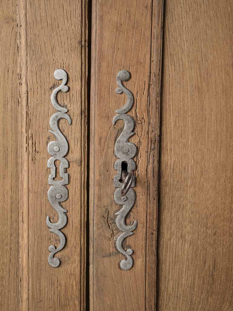 Graceful carved detail cabinet