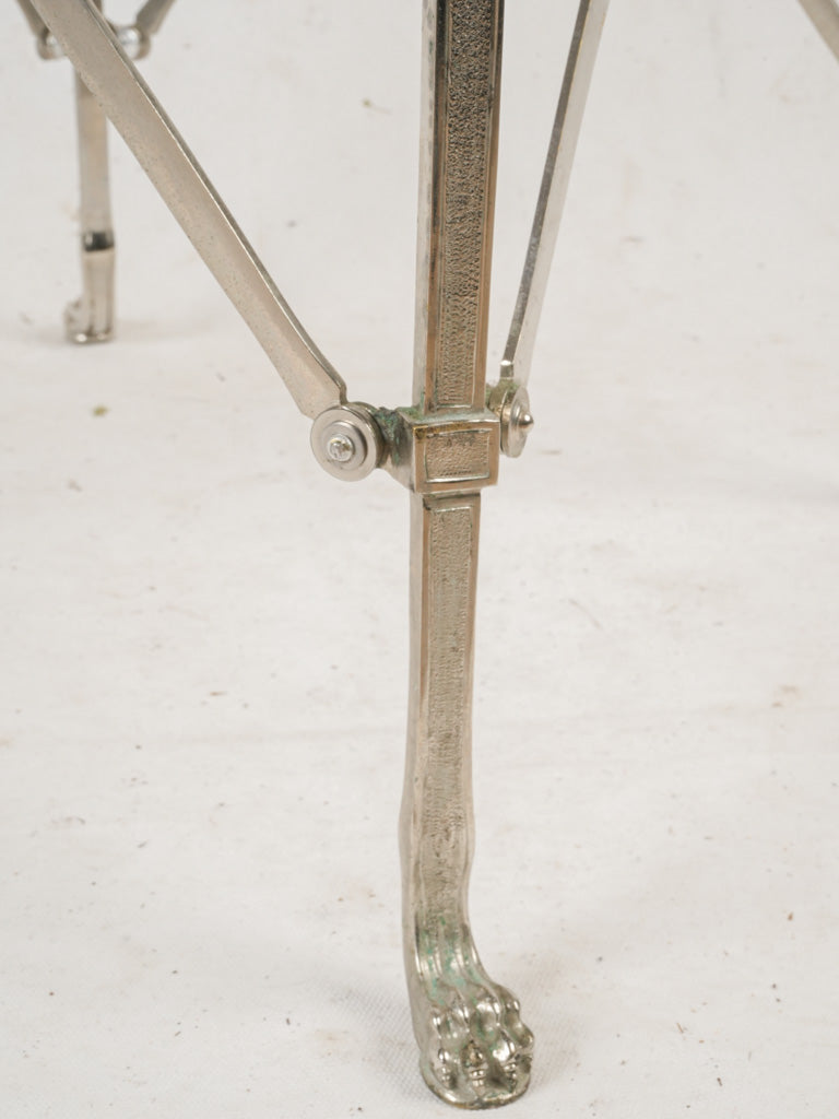Slender cross-braced legs table