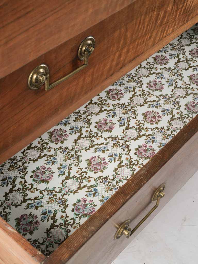 Whimsically lined antique drawers