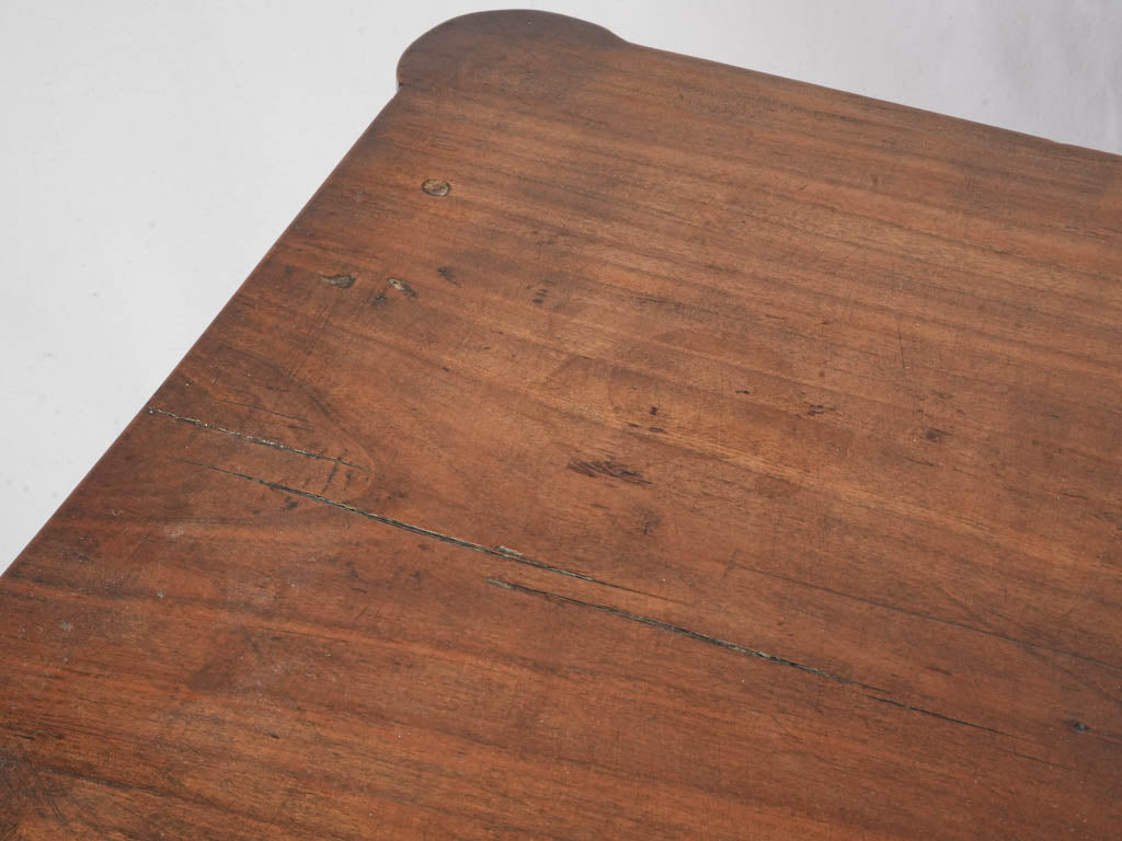 Gracefully patinated walnut commode