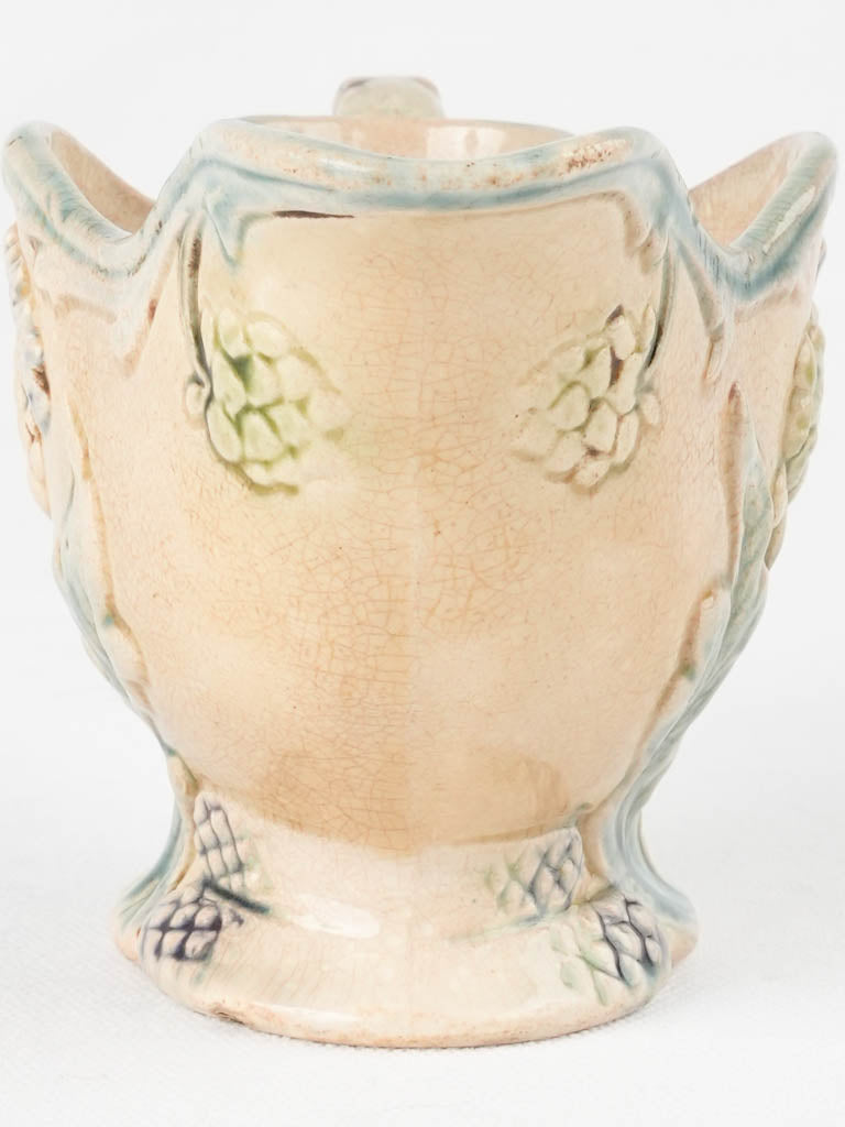 Maker's mark emblazoned Majolica sauceboat