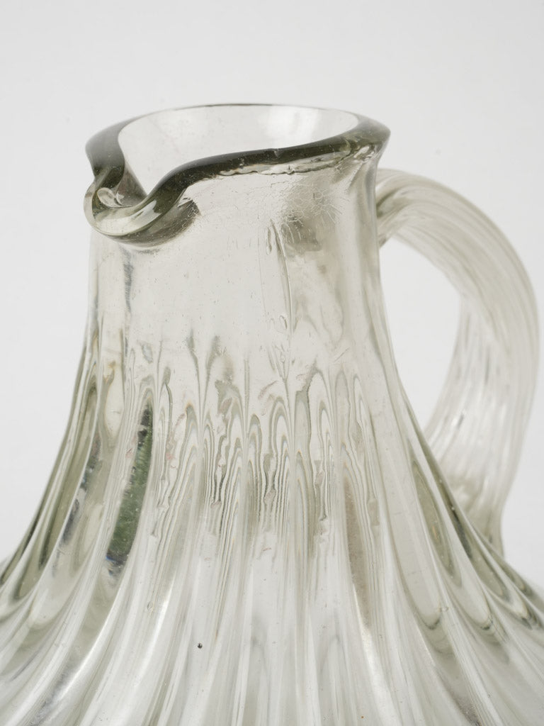 Whimsical early 20th-century glass carafe