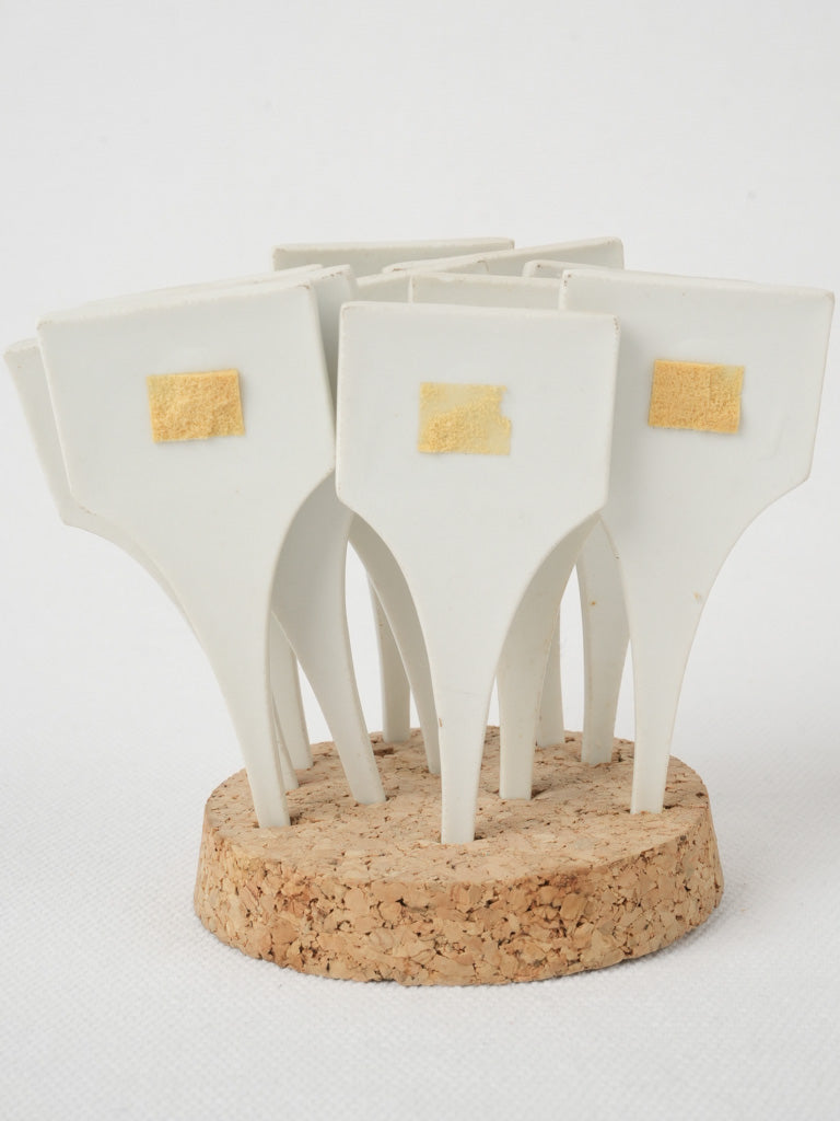 Patina-finished cheese label spikes