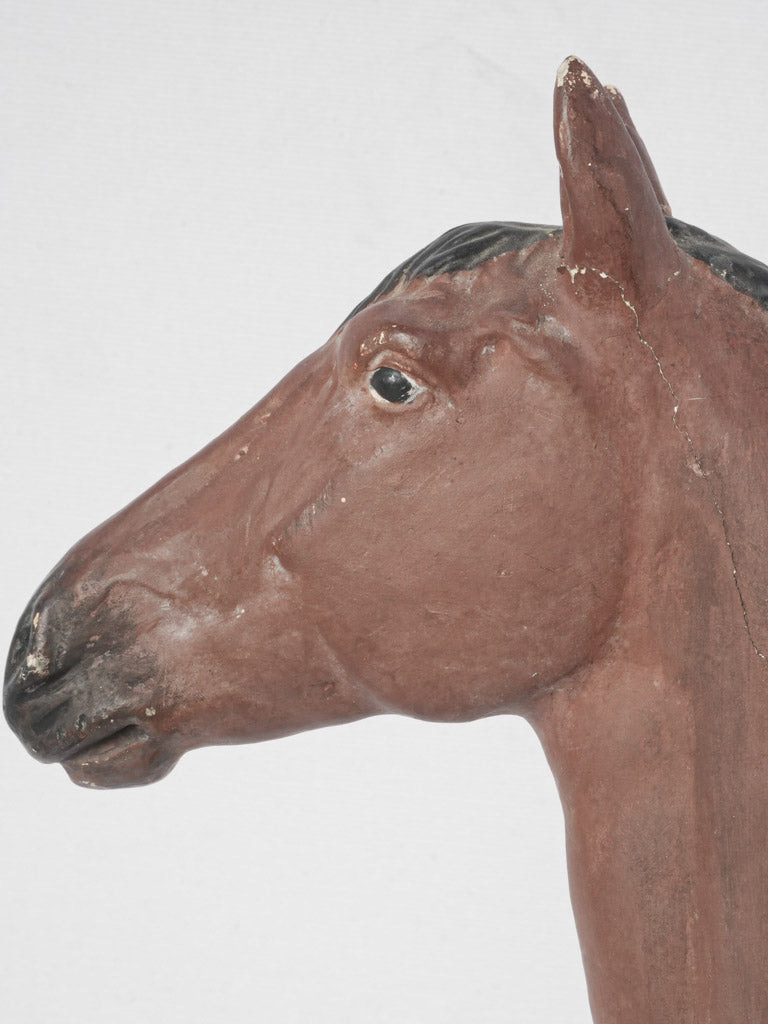 Delightful brown and black equine statue