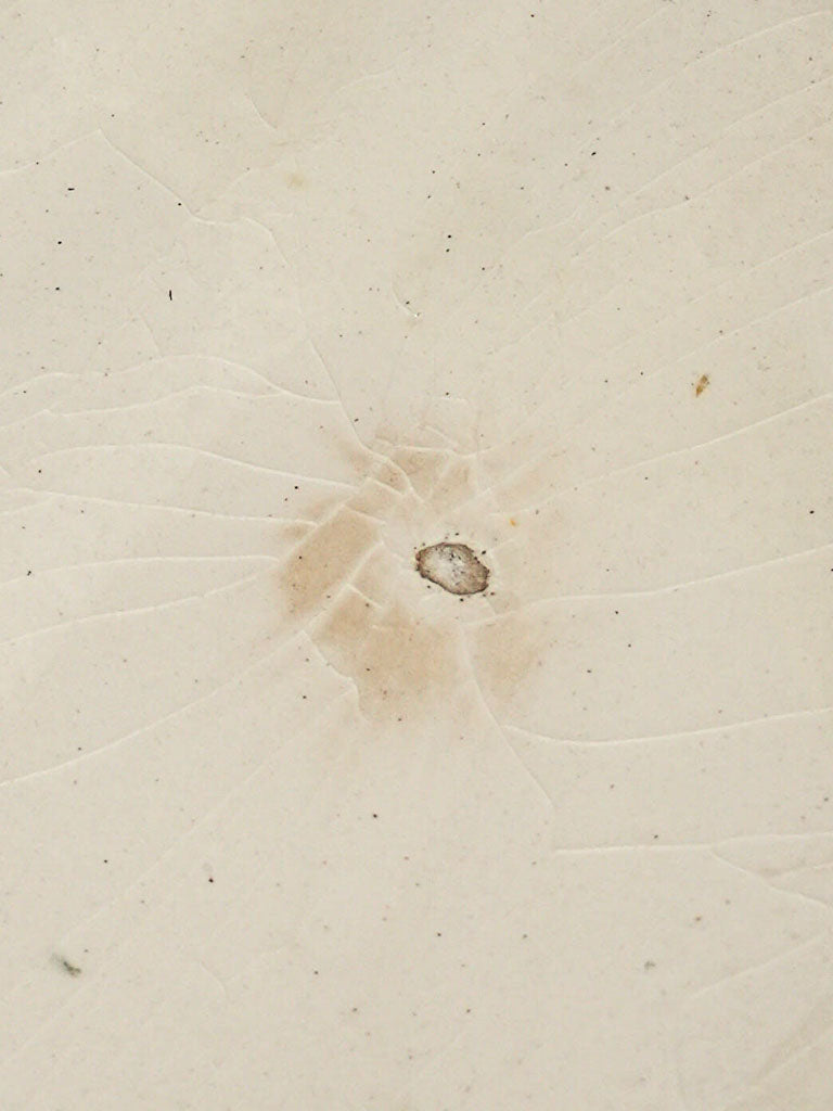 Authentic early-century barbotine cradle elegance