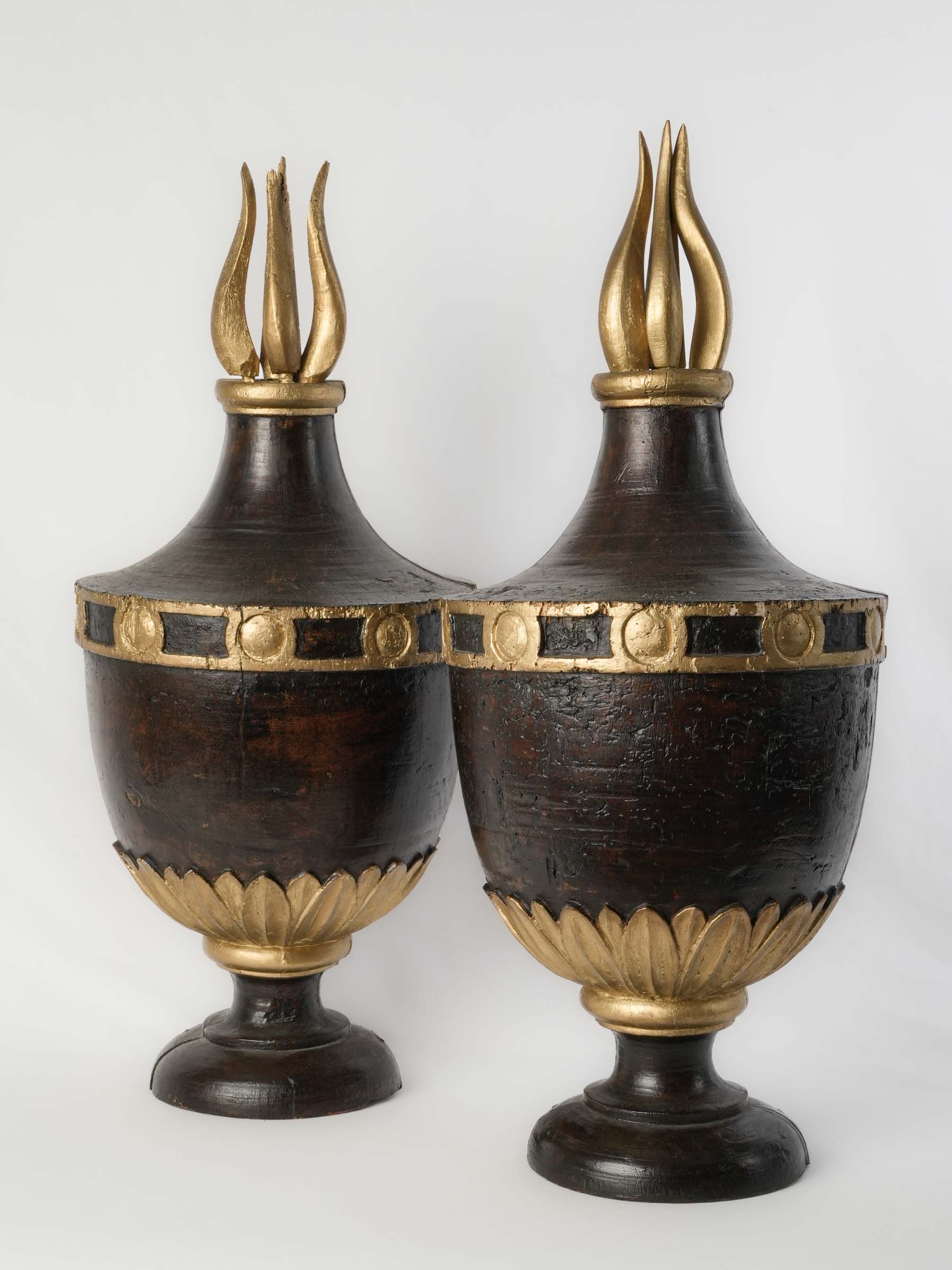 Antique carved wooden urns