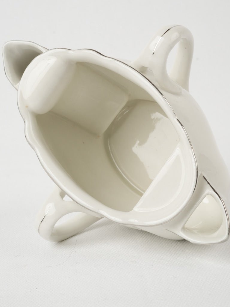 Ornate French sauce boat with silver
