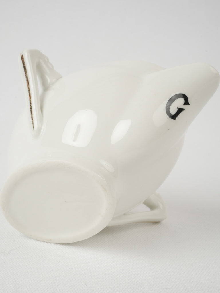 Stylish white 'maigre gras' sauce boat